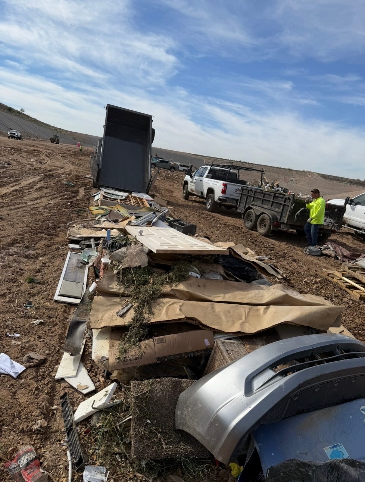 Ridgeline hauling a full load of debris to the dump
