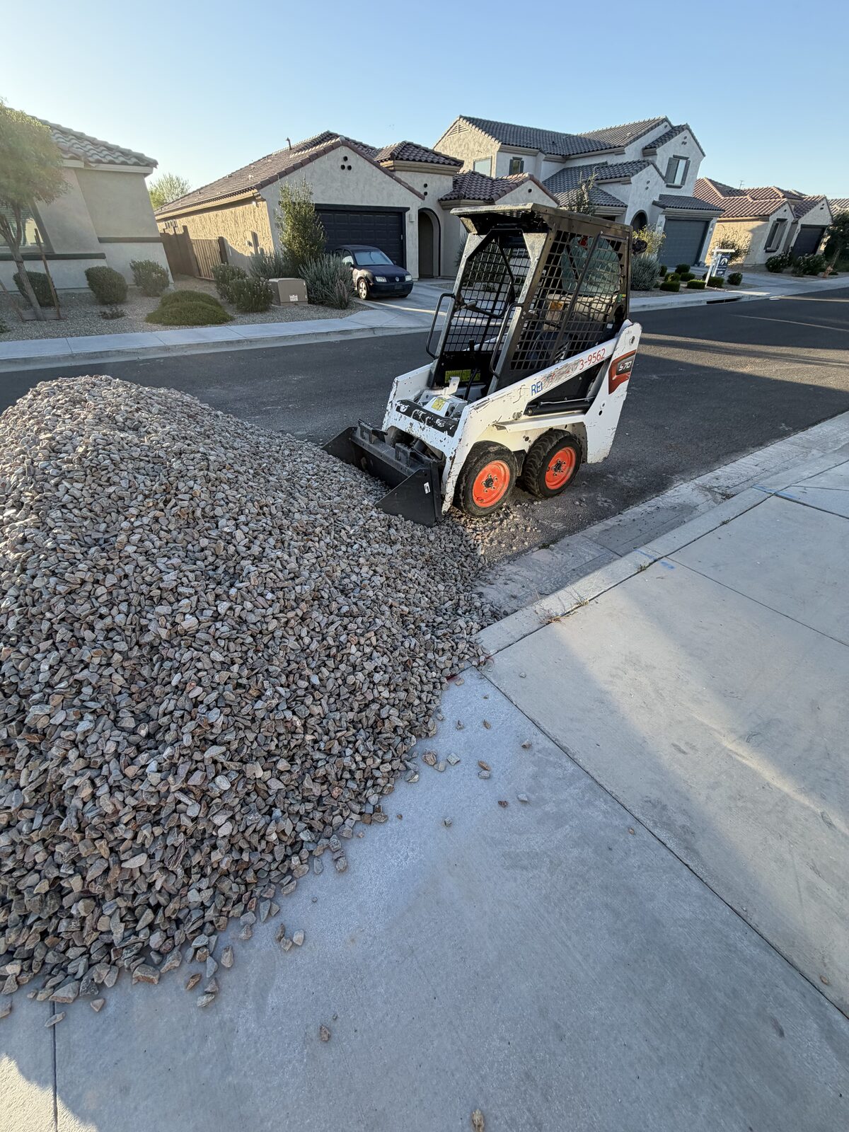 Fresh decorative rock spread across a West Valley yard